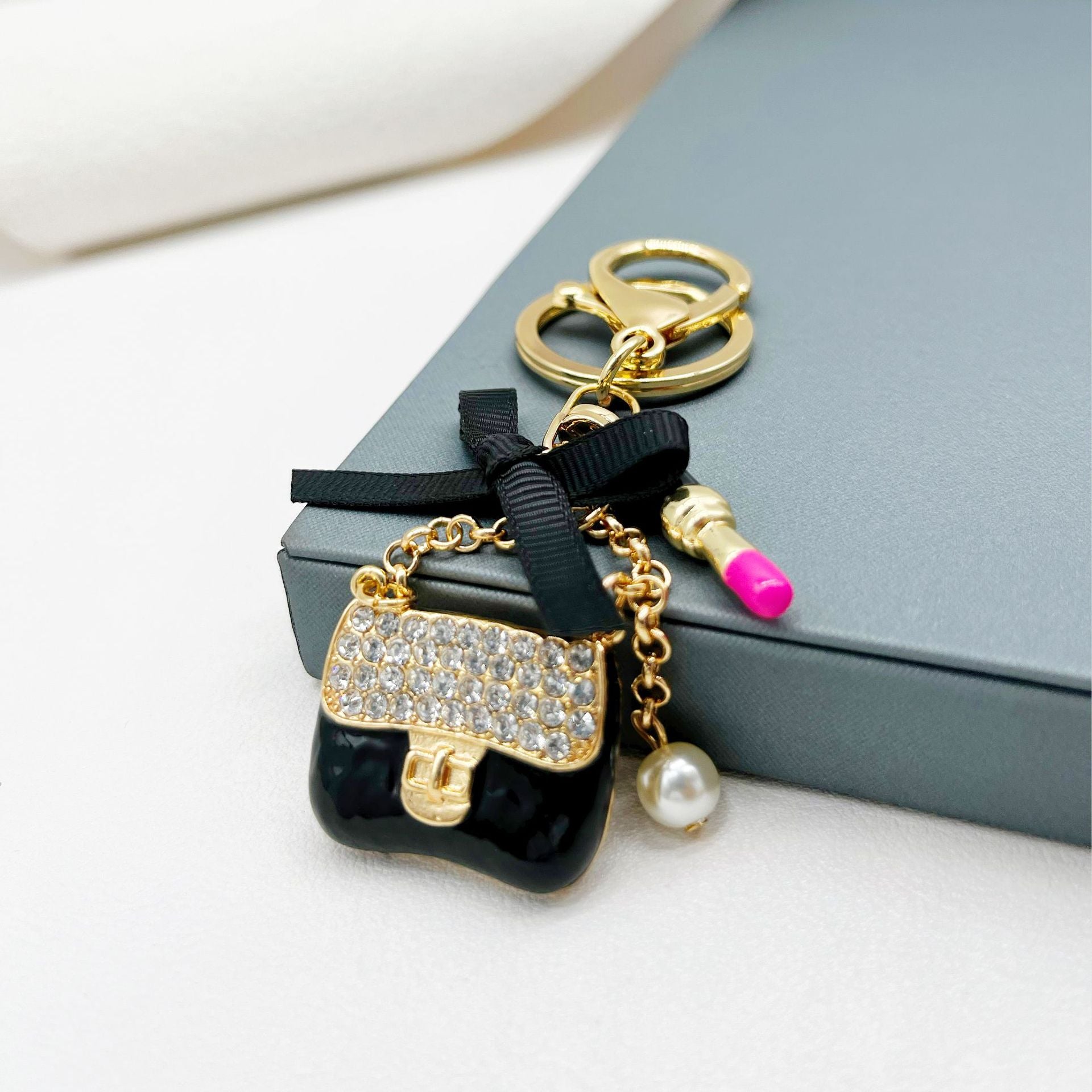Wholesale Rhinestone Lipstick Bow Small Shoulder Bag Alloy Keychain